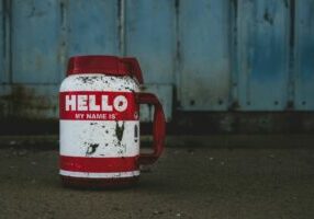 red-and-white-mug-with-name-tag